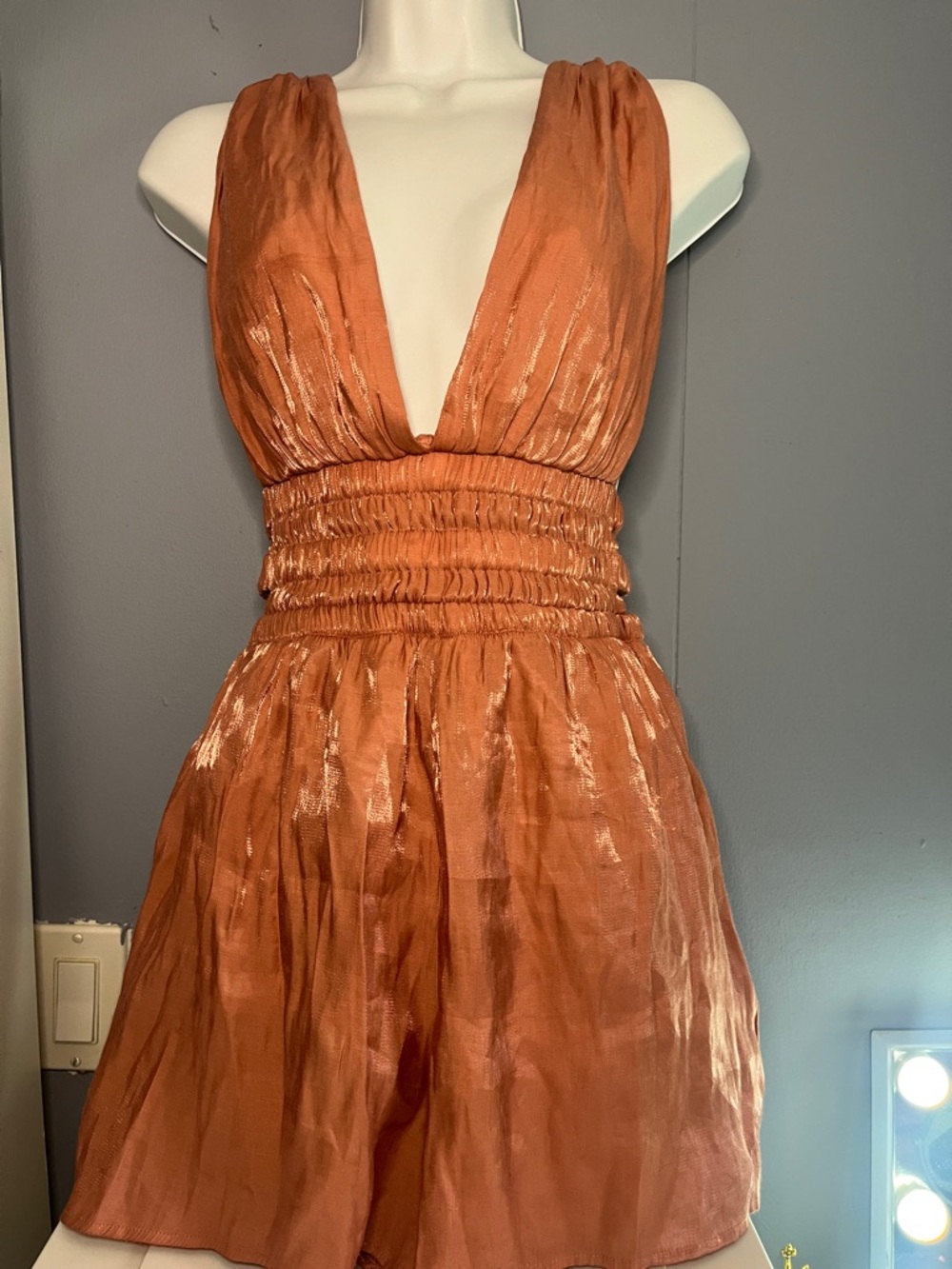 Deep V peach color Romper